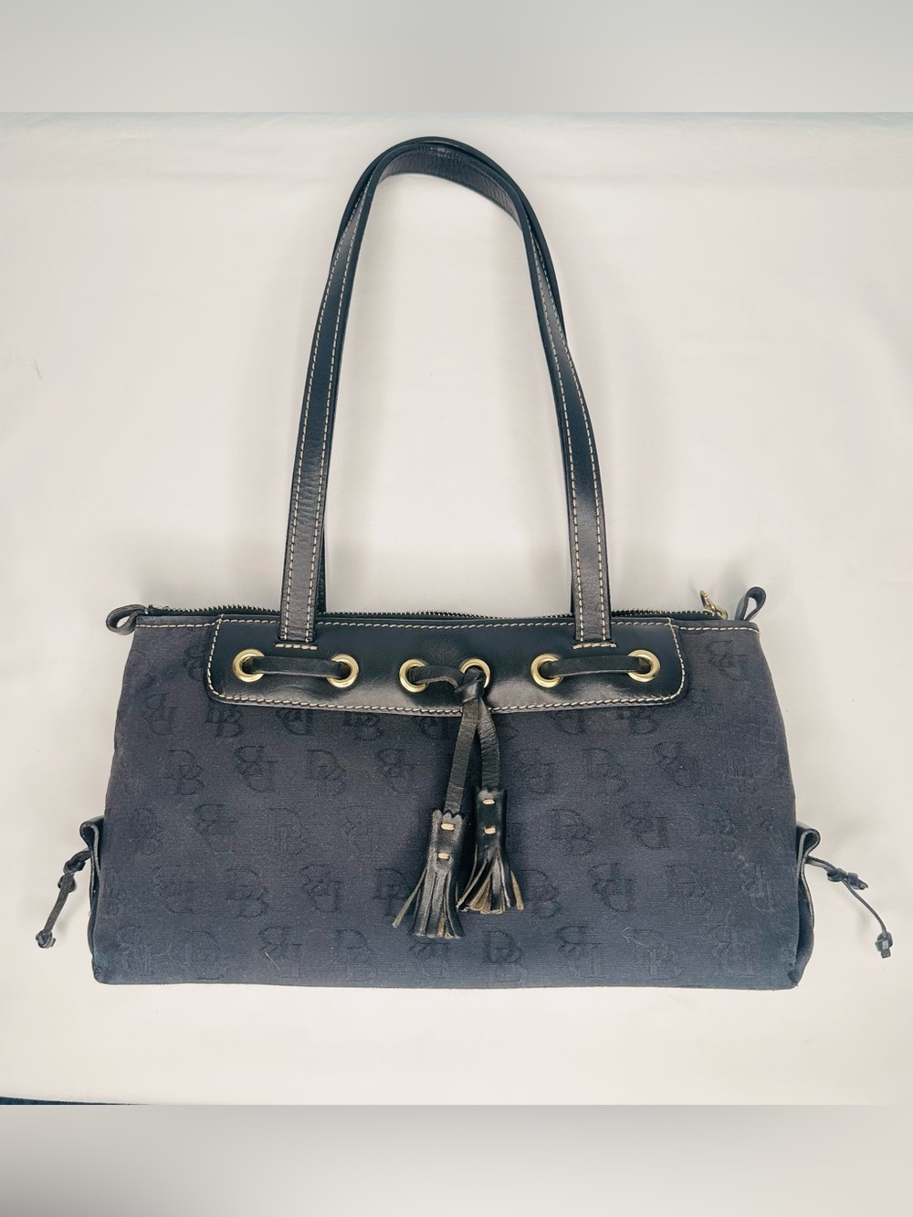 Dooney & Bourke Signature DB Monogram Tassel East-West Baguette Shoulder Bag